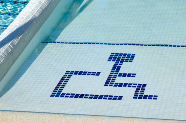 Access to swimming pool for with handicapped symbol stock photo
