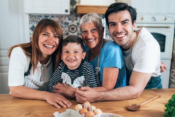 istock Happy family in kitchen 1337495704