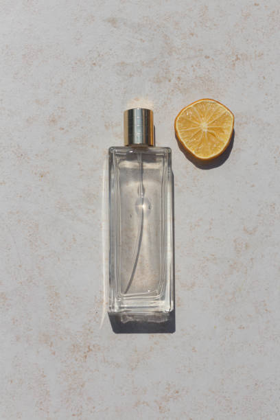 istock Minimalistic flat lay composition of a perfume bottle on a neutral background 1337498777