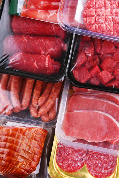 istock Composition with packages of assorted meat products 1337499276