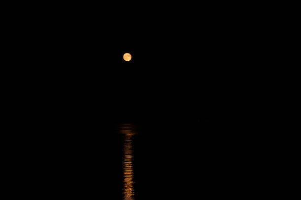 istock The Full moon reflected in the river at night 1337499904