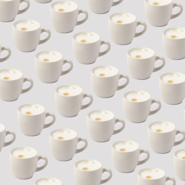 istock pattern of white cup of coffees with foam 1337500002