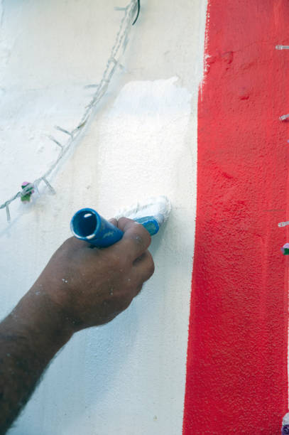 istock Painting the wall 1337500353