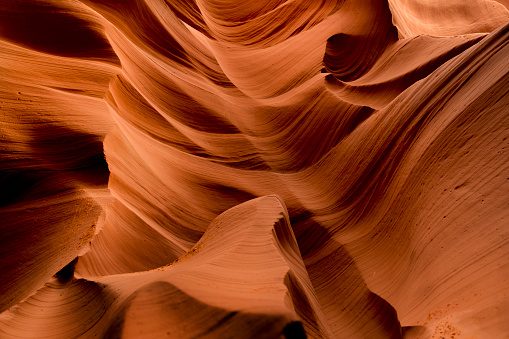 The Wave is a sandstone rock formation. It is located near the Arizona-Utah border, on the slopes of the Coyote Buttes, in the Paria Canyon-Vermilion Cliffs Wilderness, on the Colorado Plateau. It is famous among hikers and photographers for its colorful, undulating forms, and the rugged, trackless hike required to reach it.
