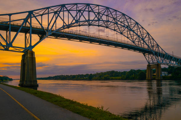 istock Seascape with arching metal bridge in Sagamore on Cape Cod at dusk 1337503471