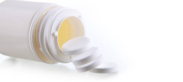 istock Composition with pharmaceutical drug pills over white background 1337504138