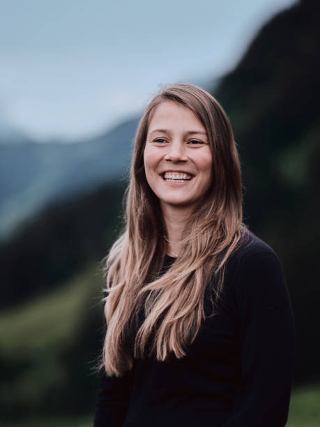 istock Young woman portrait mountain 1337511341