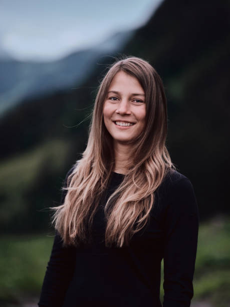 istock Young woman portrait mountain 1337511460