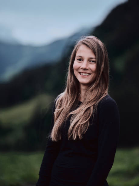 istock Young woman portrait mountain 1337511462