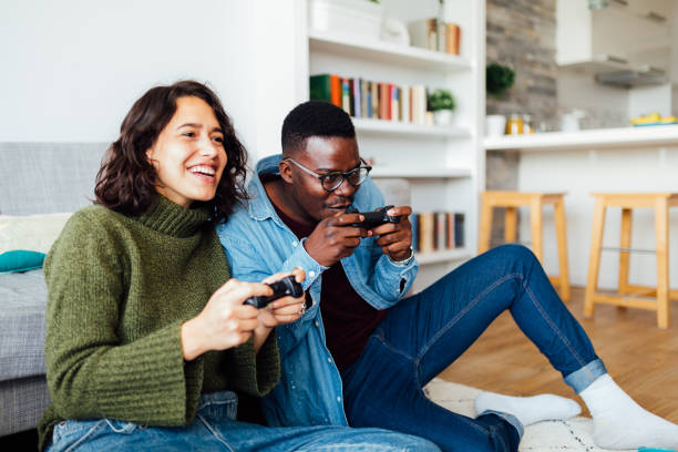 istock Happy diverse couple having fun together at home 1337513836