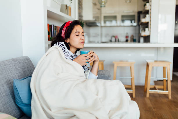 istock Young Caucasian woman suffering from corona virus symptoms 1337513955