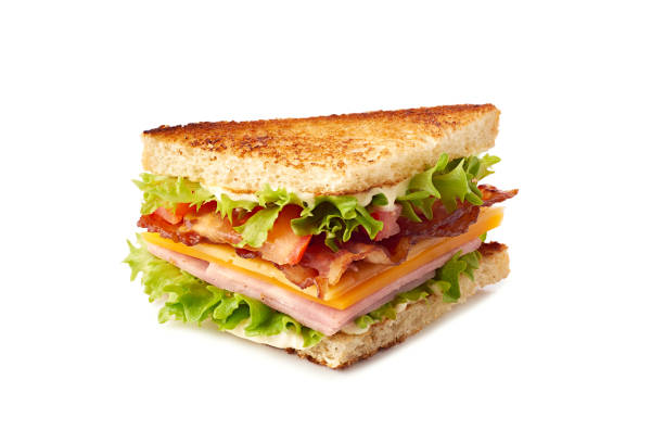 club sandwich fetta su bianco - panino ripieno foto e immagini stock