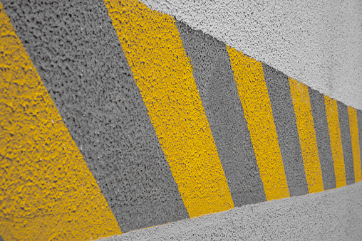 Yellow white stripes over asphalt street pavement. Pedestrian crossing, road marking zebra, urban transportation background photo