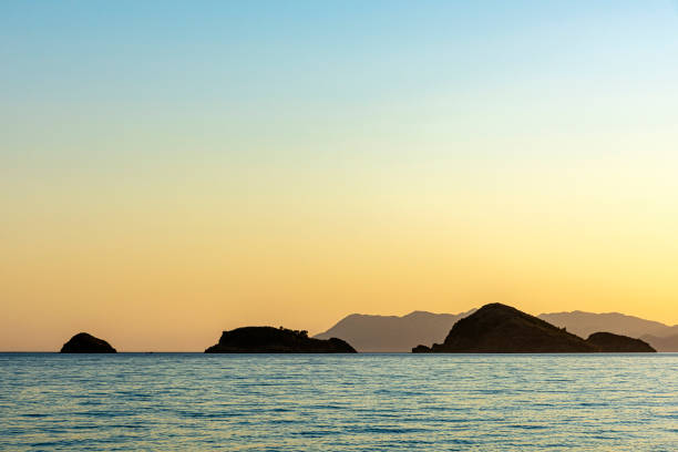 Seascape with three islands at sunset in Fethiye, Turkey.