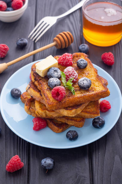 istock French toast with berries and honey 1337521101