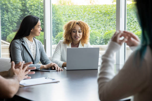 istock Diverse colleagues discuss something during meeting 1337522875