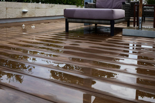 istock Water leaking and flooded on wood  floor. 1337550343