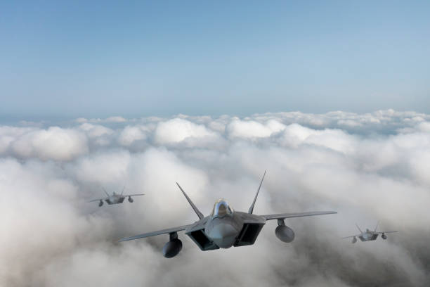 istock Jet fighters flying over the clouds. 1337551437