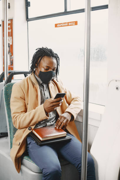 istock Young African businessman in a bus 1337555920