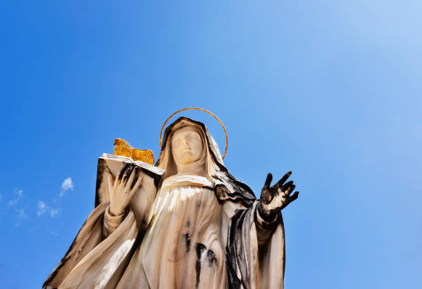 Montecassino Abbey -Italy -statue of St. Scolastica against blue sky  , Benedictine monastery