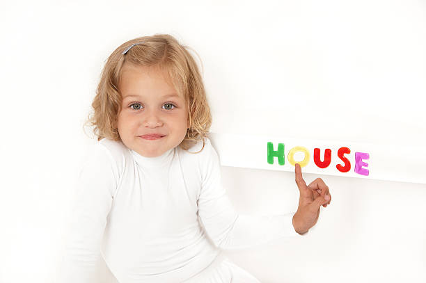 istock Blonde little girl dressed in white 133756019