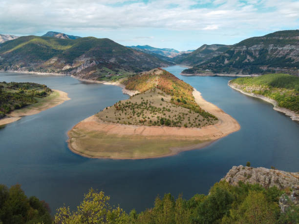 istock Beautiful landscape with a river in the summer view from a drone 1337561241