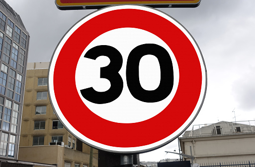 Speed limit sign at 30Km / h  Paris France