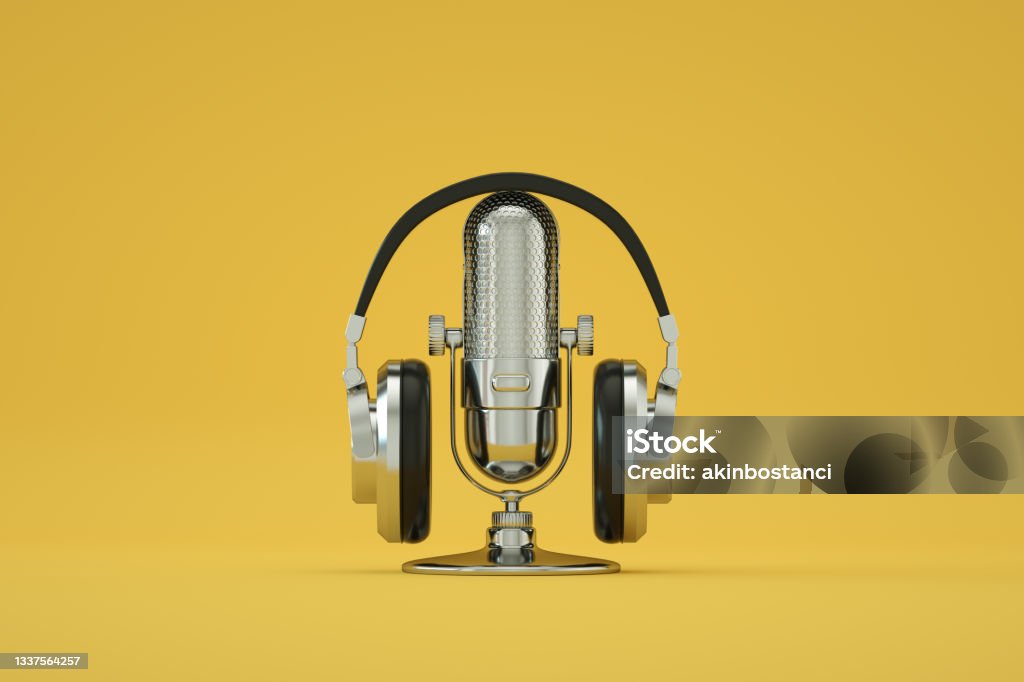 Retro Old Microphone and Headphones, Vintage Style, Yellow Color Background 3d rendering of Retro Old Microphone and Headphones, Vintage Style, Yellow Color Background. Microphone Stock Photo