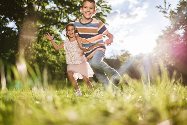 istock Beautiful children running in nature 1337571098