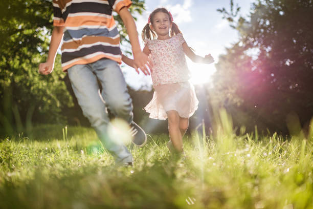 istock Beautiful children running in nature 1337571135