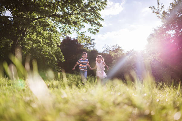 istock Beautiful children running in nature 1337571146