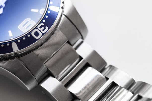 istock Mans wrist watch fragment stainless steel case 1337571864