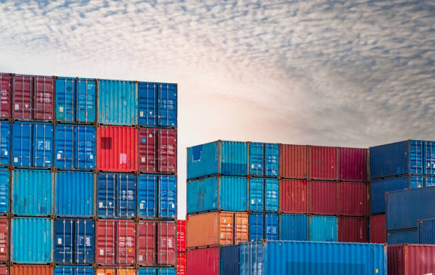 istock Container logistic. Cargo and shipping business. Container ship for import and export logistic. Container freight. Logistic industry. Blue and red container against white sky for truck transport. 1337572328
