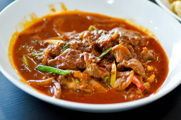 istock stir fried pork with red curry or stir fried beef 1337574946