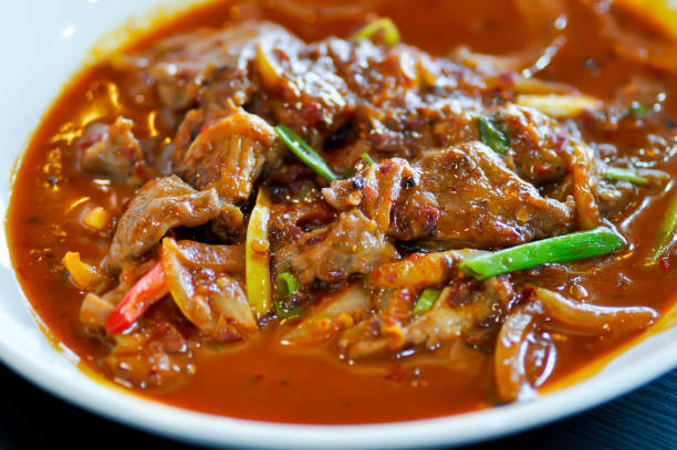 istock stir fried pork with red curry or stir fried beef 1337574970