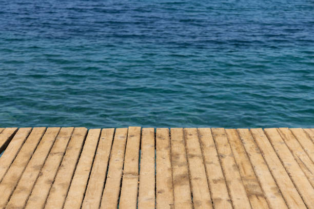 blue sea and wooden pier background
