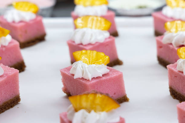 A slice of vanilla raspberry cake.