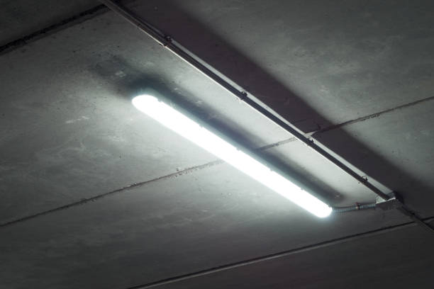 istock Fluorescent tube lamp in a garage. 1337579763