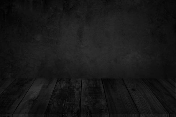istock Empty wooden table top on black dark concrete wall background, Design wood counter white. Perspective for show space for your copy and branding. Can be used as product display montage. 1337580280