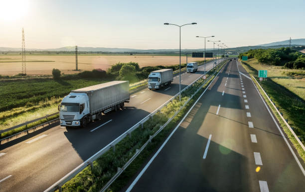 istock Transportation trucks in line 1337580307