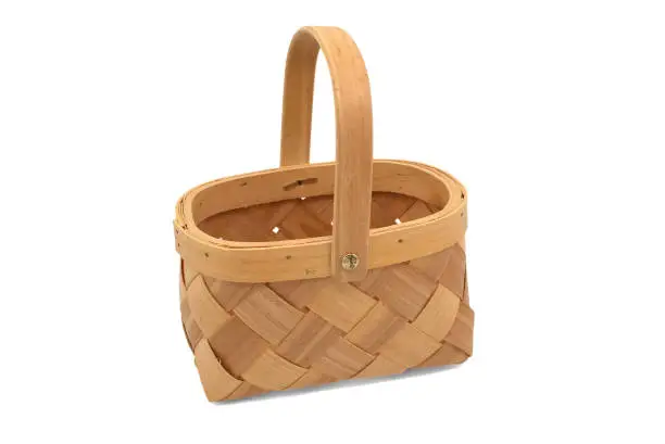 Wooden woven storage basket, houseware storage basket with handle over a white background