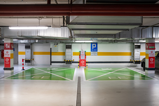 Gdynia,Poland-August 2021:The position of charging electric vehicles company Energa in the underground parking