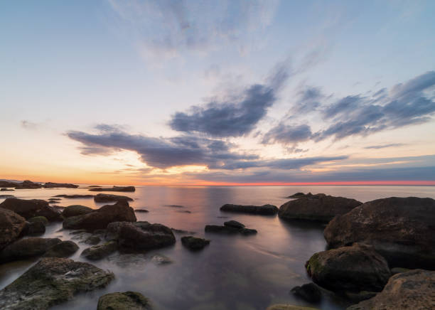 istock Autumn sunrise whit long exposure 1337587606