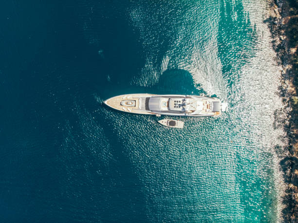 The beautiful landscape with a white liner in the middle of a blue sea