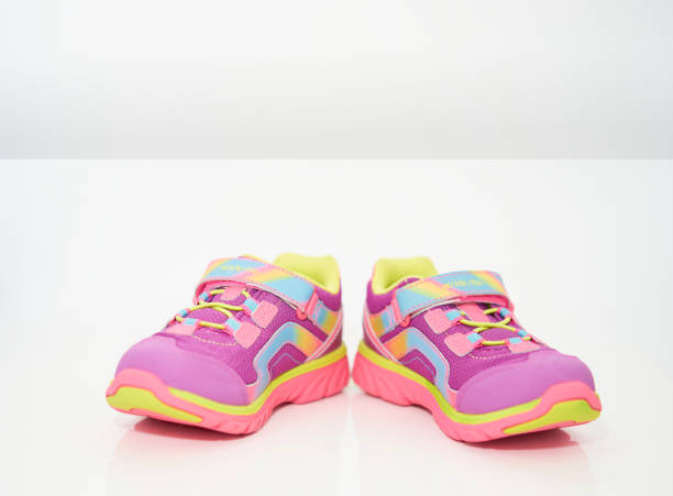 istock color kid  sneakers shoes on floor front view soft focus 1337593885
