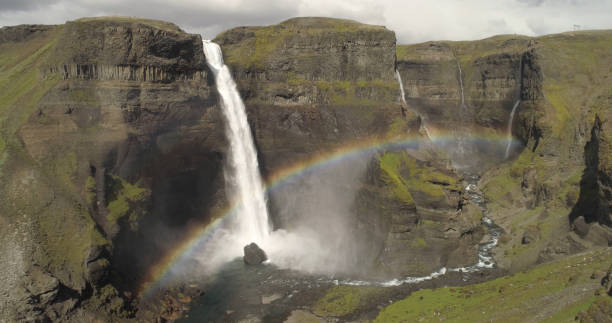 istock Aerial view over Rainbow at haifoss Waterfall, Iceland 1337594640