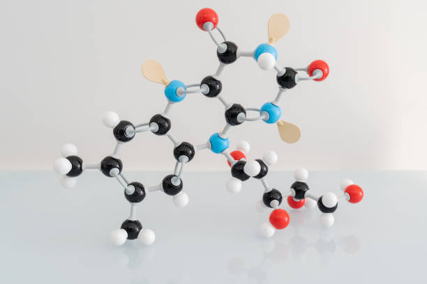 istock Isolated vitamin B2 made by molecular model with reflection on white background. Riboflavin chemical formula with colored atoms and bonds. 1337595625