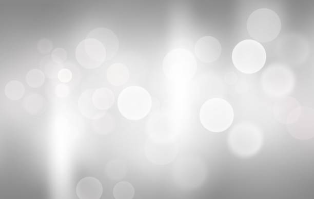 Gray abstract background. white bokeh blurred beautiful shiny lights. use for Merry Christmas, happy new year wallpaper backdrop and your product. Gray abstract background. white bokeh blurred beautiful shiny lights. use for Merry Christmas, happy new year wallpaper backdrop and your product. lightbox photos stock pictures, royalty-free photos & images