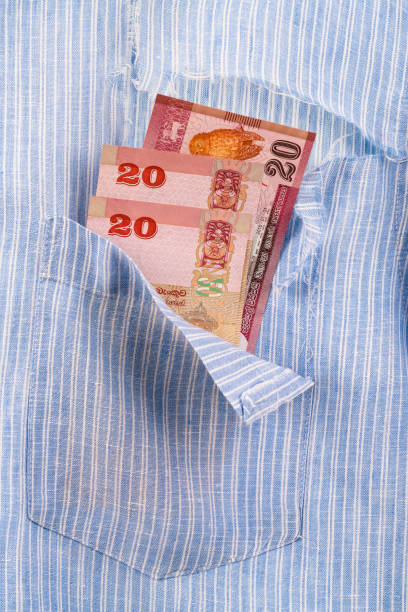 istock Ripped shirt pocket with last remaining banknotes 1337596525