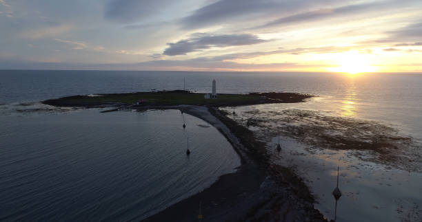 istock drone view from Iceland Lighthouse at sunrise, February 2021 1337596918